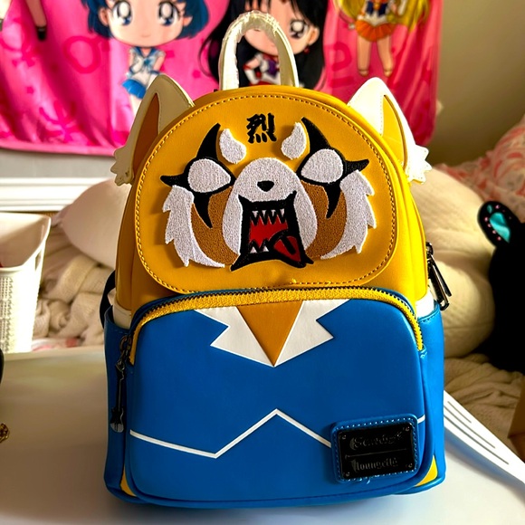 NWT Loungefly Sanrio Aggretsuko Two Faced Backpack - Picture 1 of 3